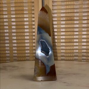 Elegant Brown and Gray Decor Accent with Sculptural Design